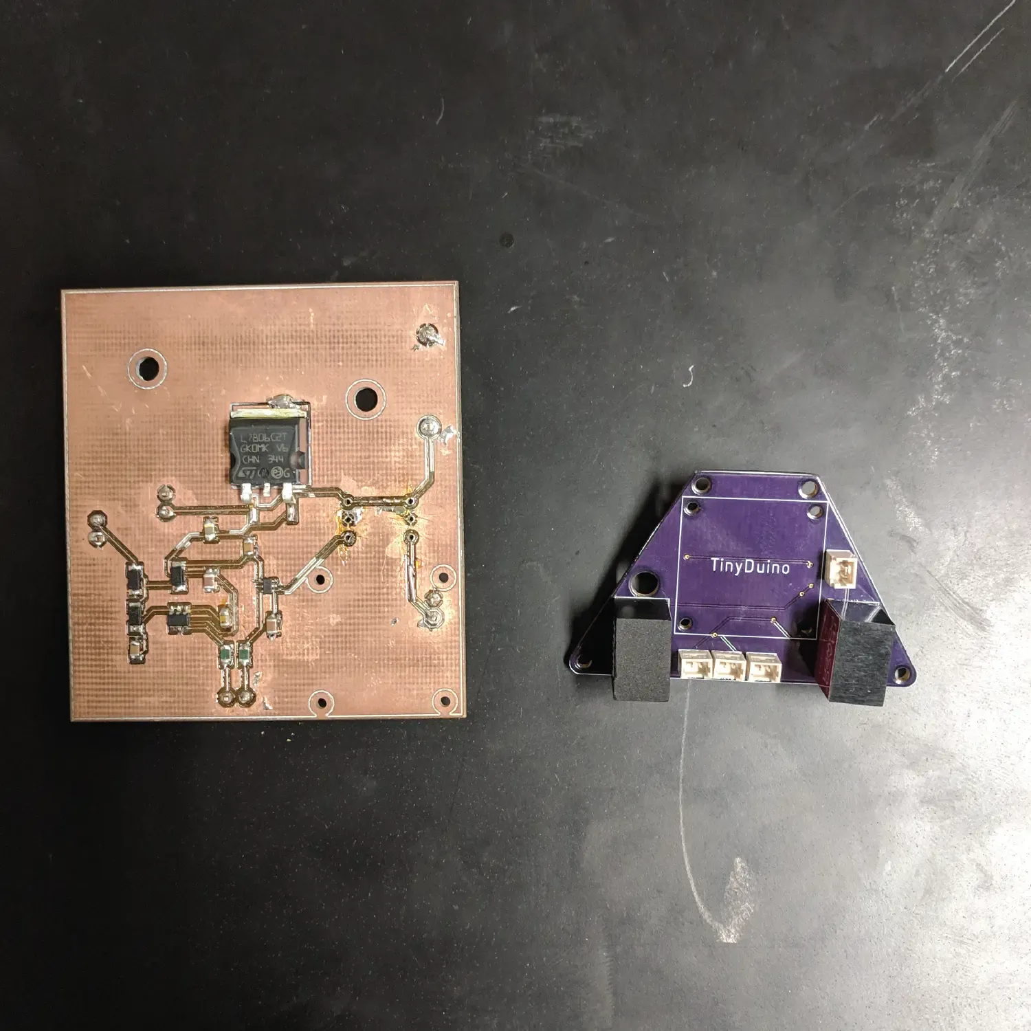 A side by side view of the prototype board with the completed board.