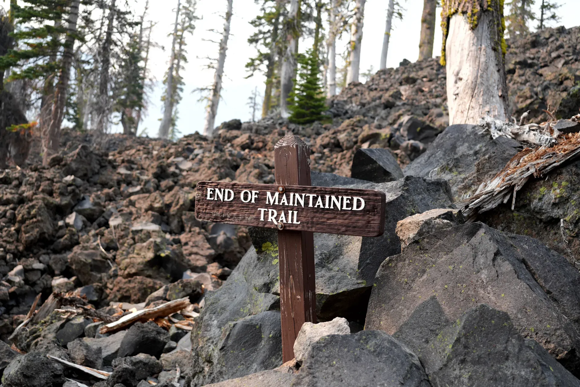End of maintained trail sign.