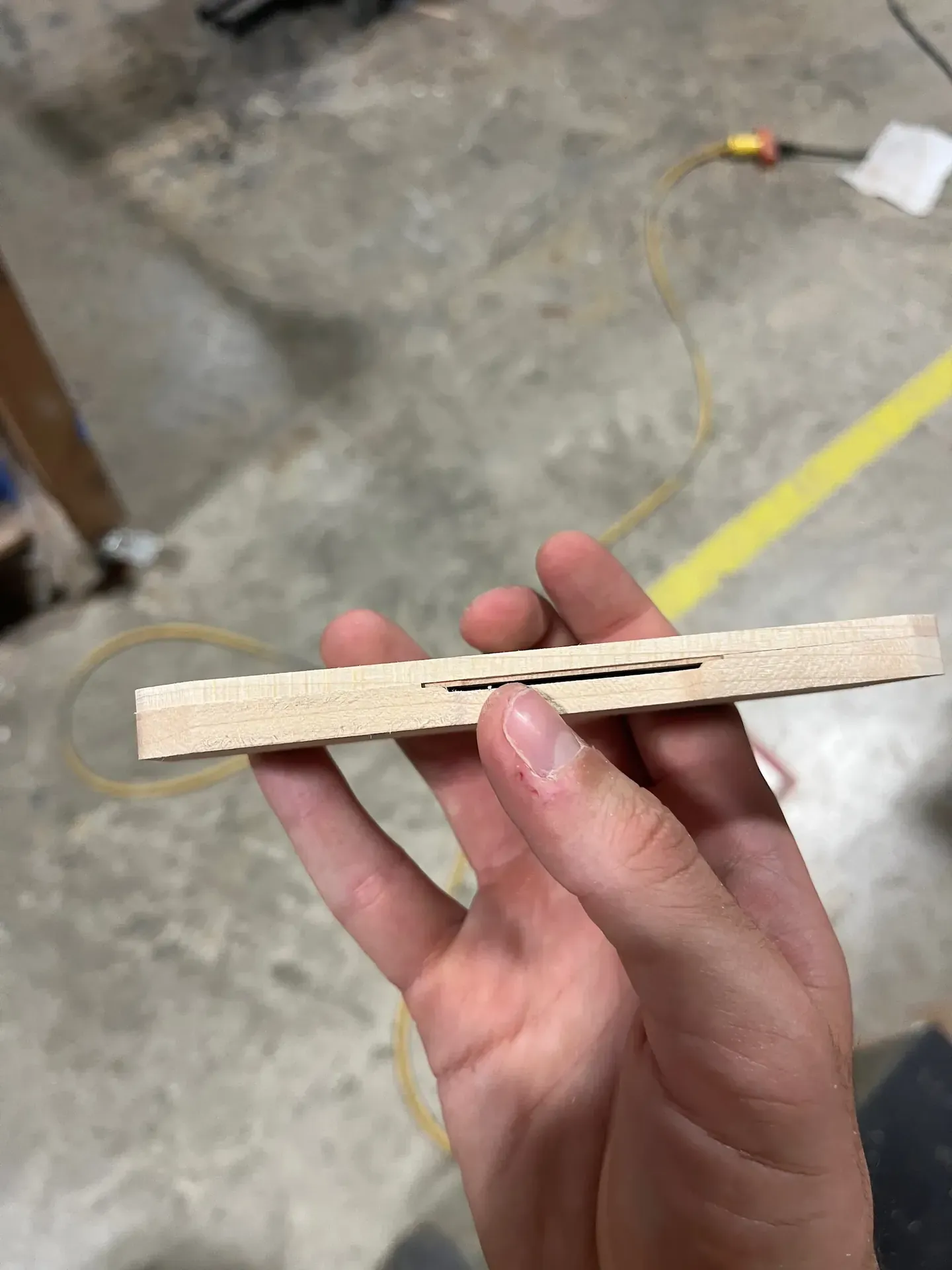 Side profile of a milled wooden pencil case